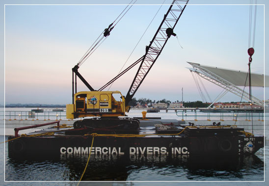 commercial divers barge with crane at work side